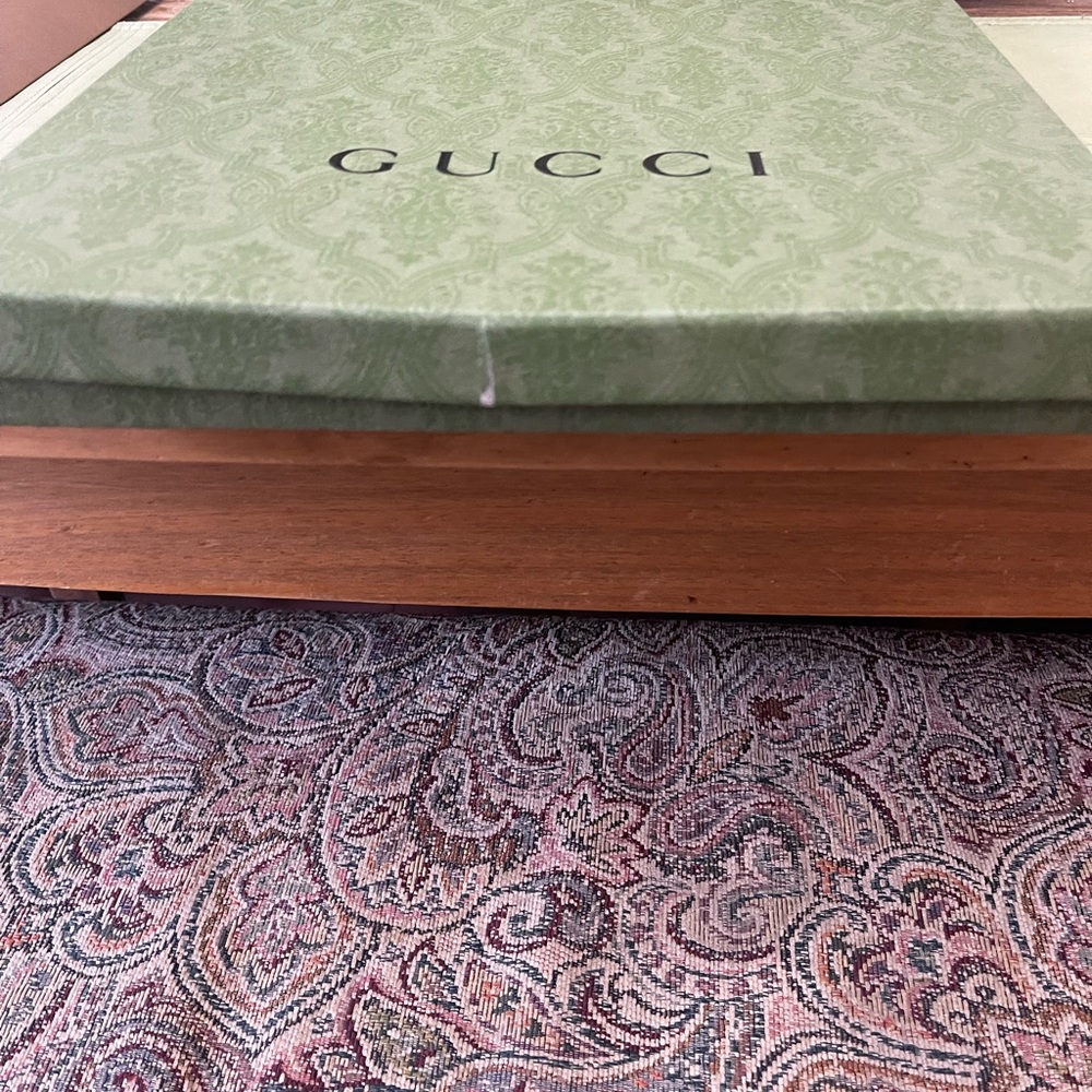 Gucci tshirt box. Has a small tear on one side.